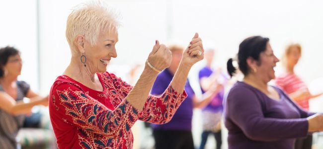 Elderly people in a dance class