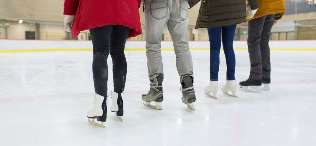 People skaing on a rink 